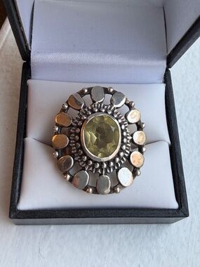 Giant sitrine & sterling silver floral motif ring.